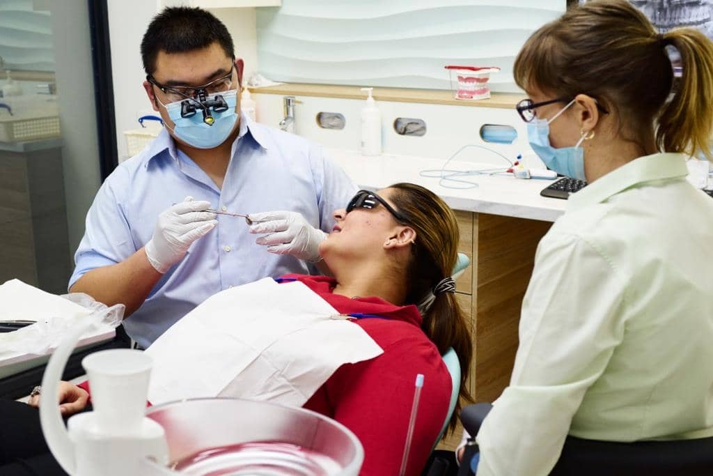 dentist attending to patient
