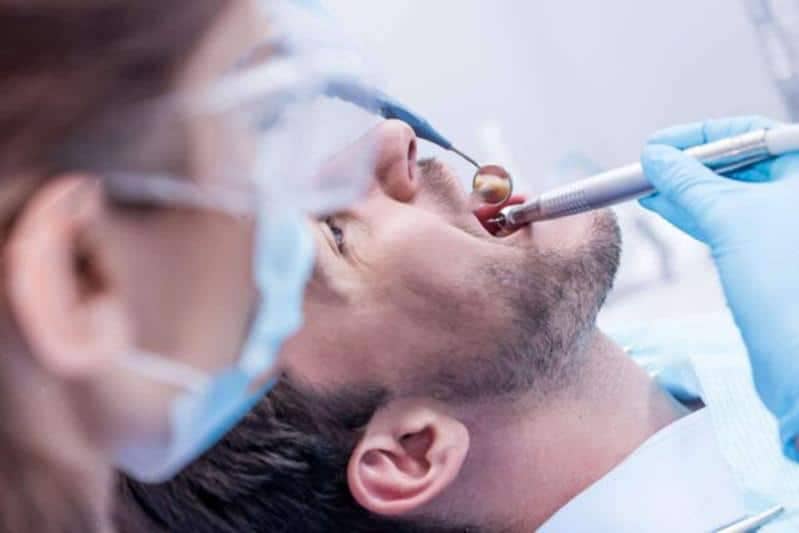 man getting dental checkup