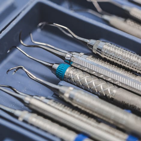 Periodontal probes on a blue tray