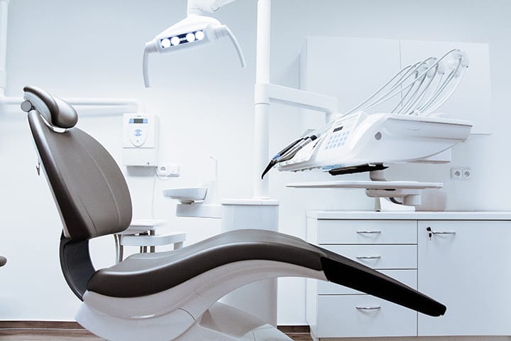 dental clinic interior with chair and tools