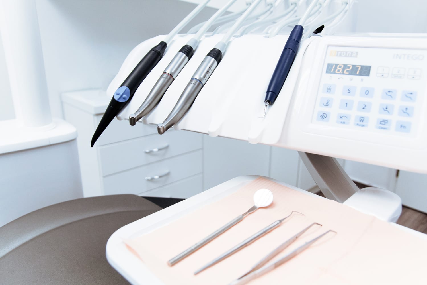 dental tools on top of a dental chair